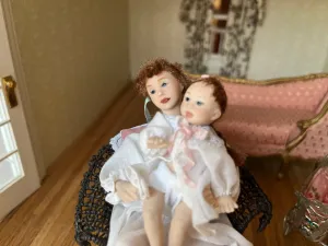 Dollhouse Miniatures~ Signed MT BT 1999 Mother & Baby Doll in Brown Wicker Chair