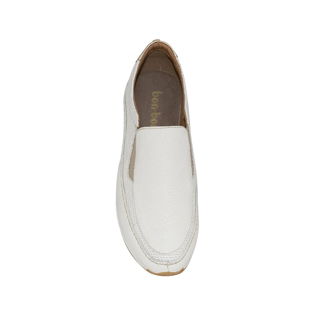 Pure white leather sneakers with embossed elastic detailing