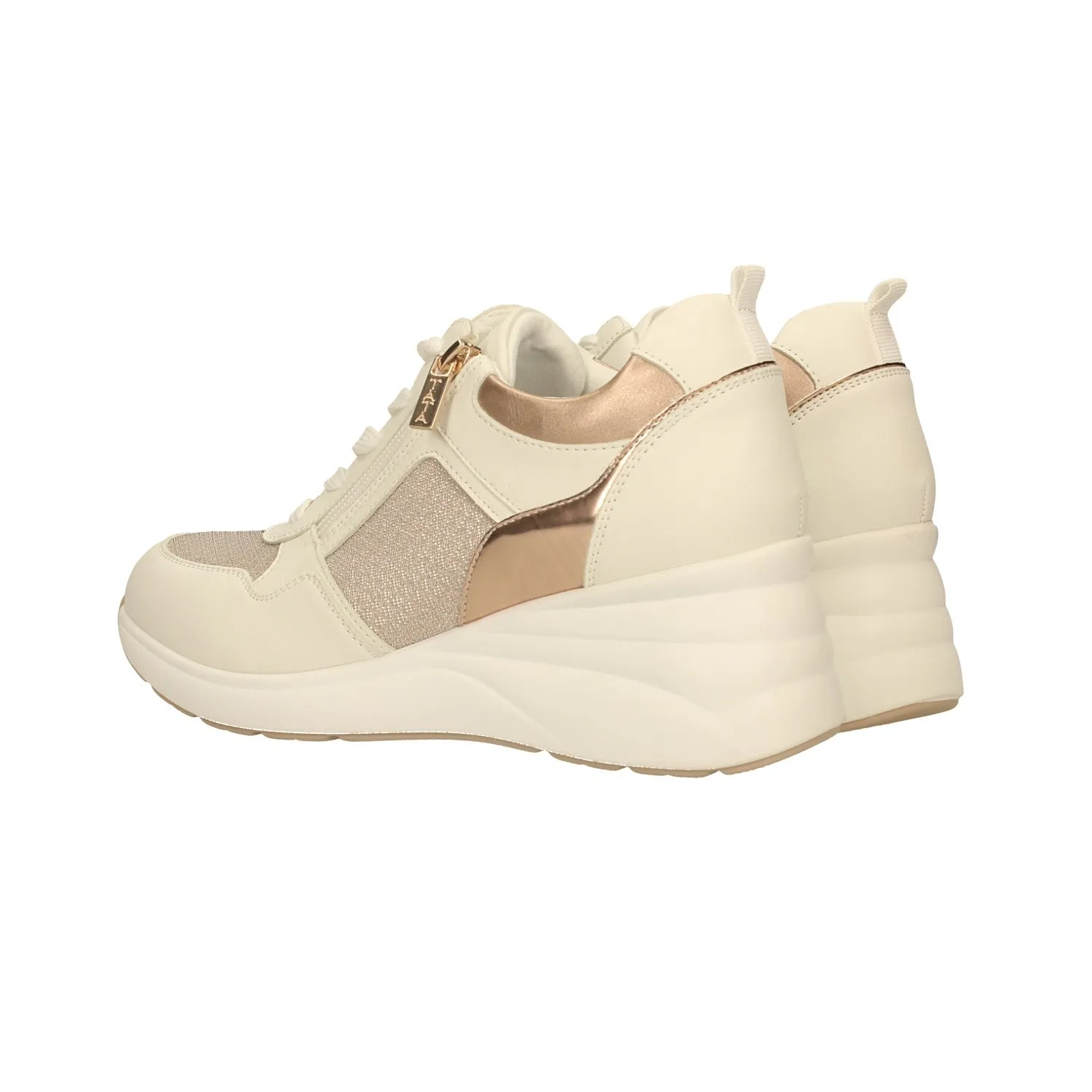 Sneakers con cerniera. Tacco alto 6 cm